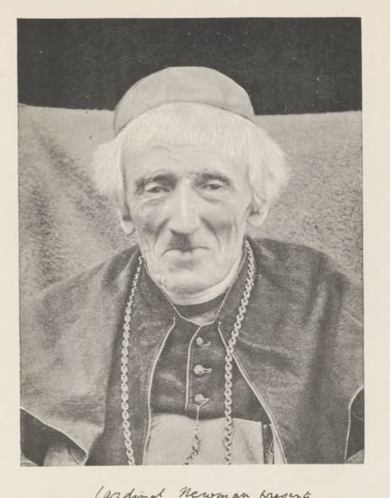 Late nineteenth-century photographic portrait of John Henry Newman seated and facing the camera.